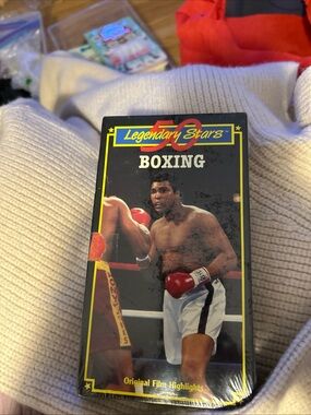 Source Unknown Legendary Stars Boxing VHS with Black, Yellow, Red Accents